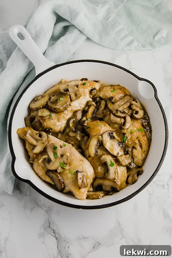 A cooking pan with chicken marsala after cooking.