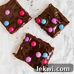 Three cosmic brownies sitting on a counter.