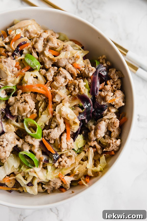 A hearty and colorful egg roll in a bowl recipe, showcasing its delicious ingredients.
