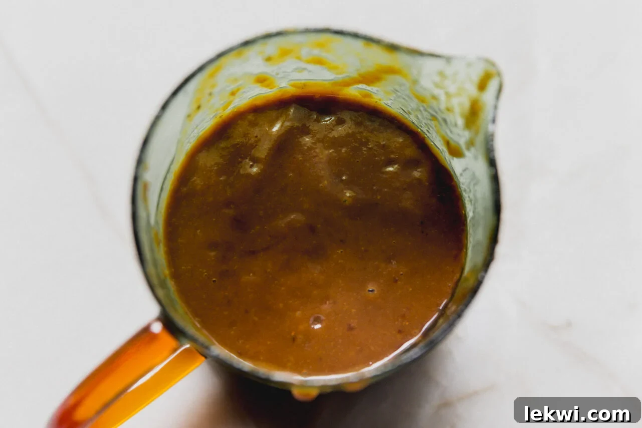 BBQ sauce in a measuring cup.