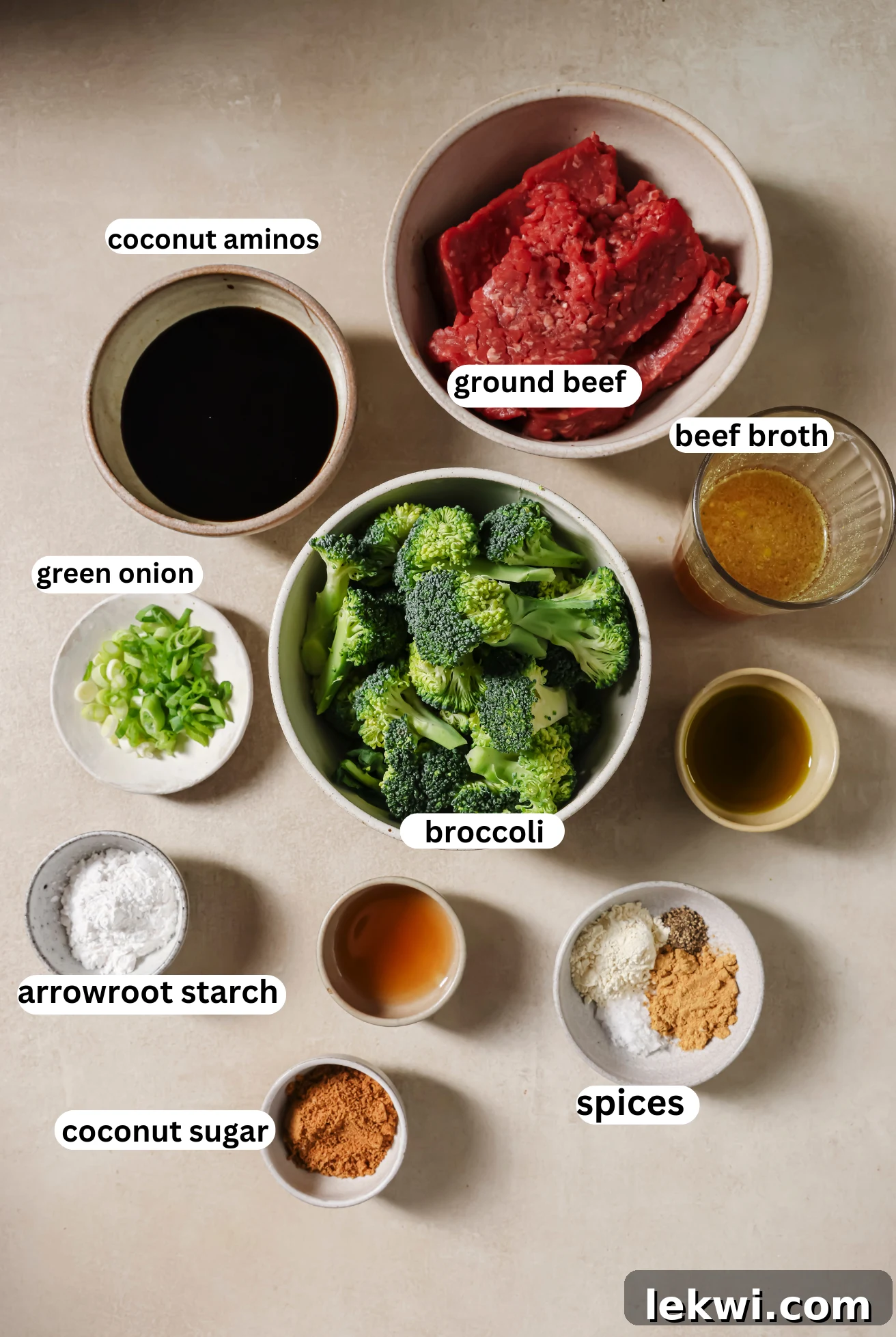 Ground beef and broccoli ingredients in separate bowls