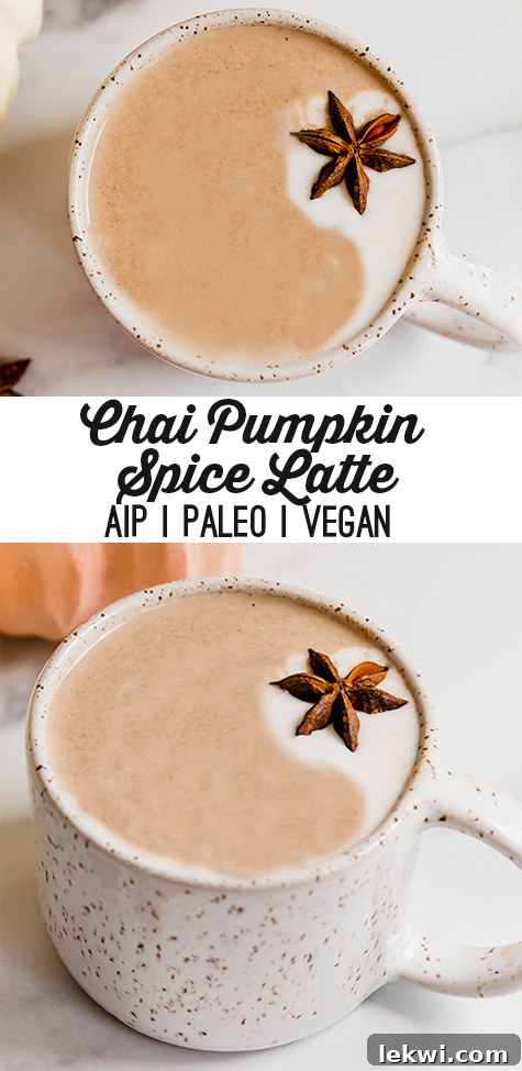 A ceramic mug filled with a frothy Chai Pumpkin Spice Latte, with text overlay reading "Chai Pumpkin Spice Latte AIP Paleo Vegan", set against an autumn backdrop.