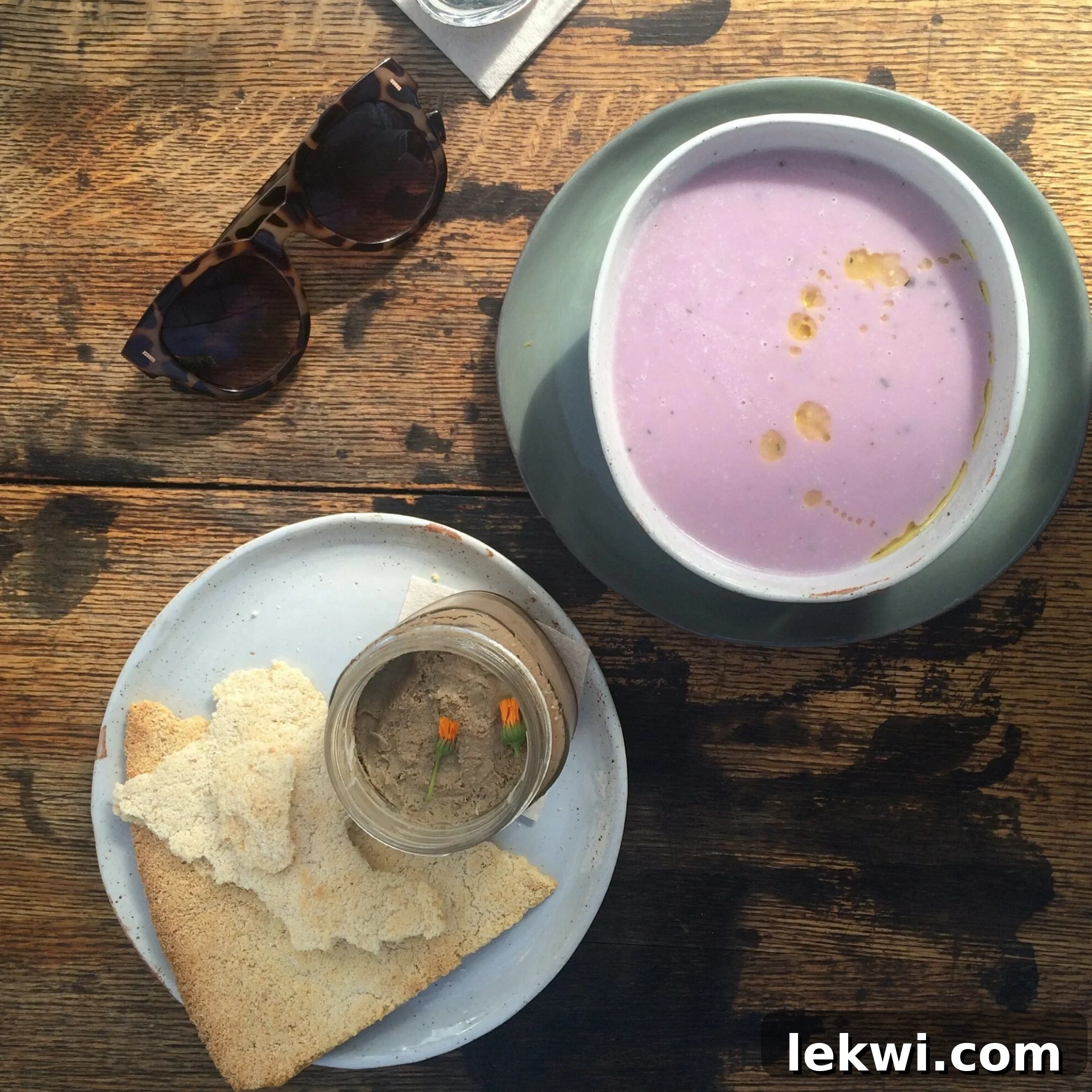 A spread of AIP-compliant dishes at Mission Heirloom: cauliflower soup, chicken liver pate with apple sauce, and Yucan Crunch.