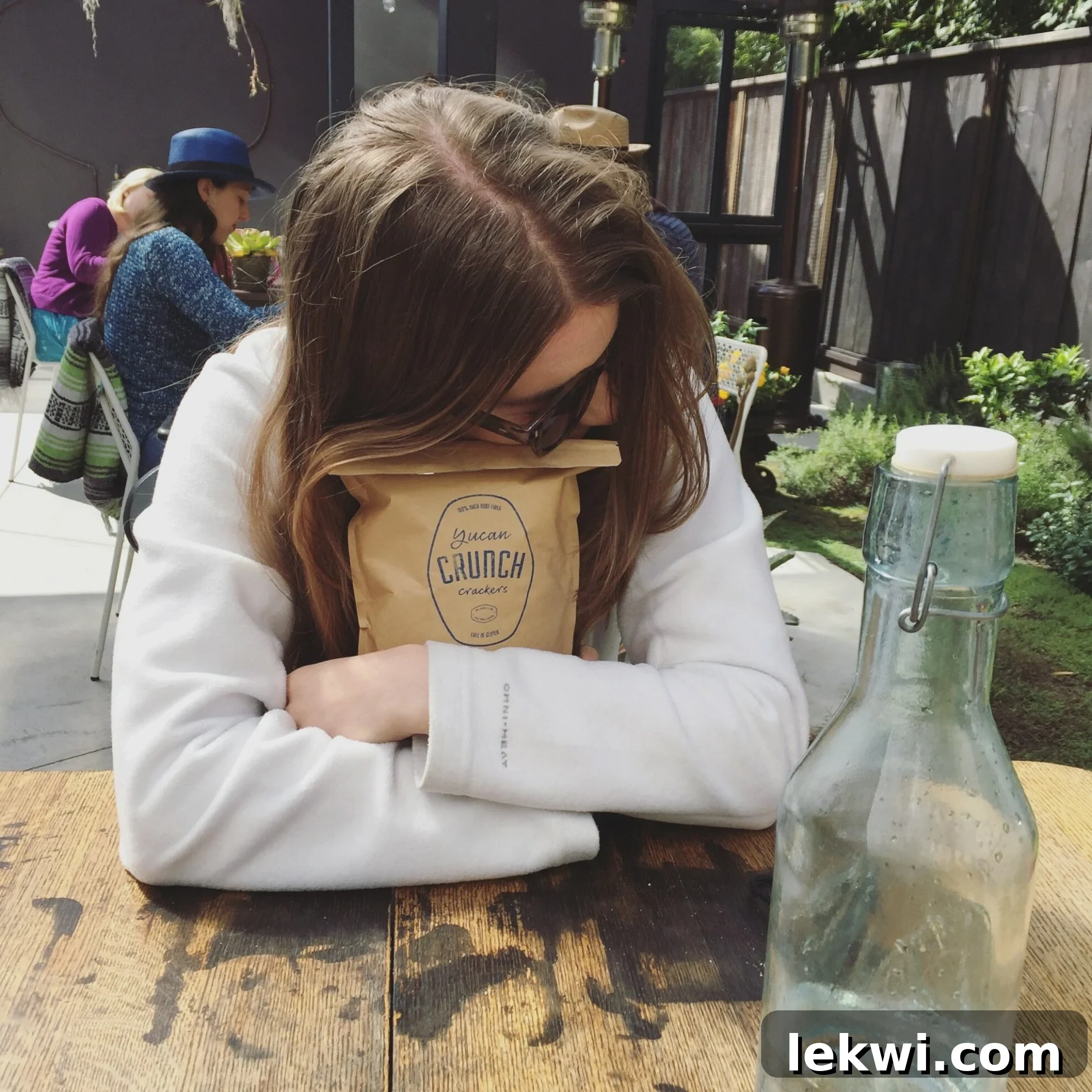 A close-up of the highly acclaimed Yucan Crunch, an AIP-friendly cracker made from yuca, served with a side of coconut oil.