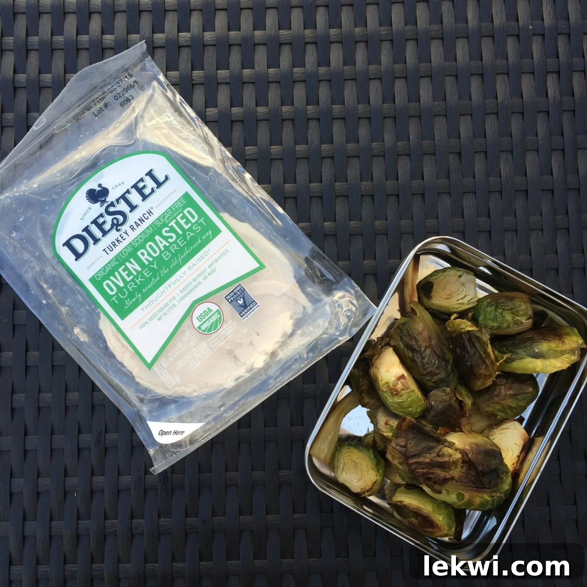 A second AIP lunch, featuring roasted Brussels sprouts, parsnips, avocado, and turkey slices, ensuring a safe meal on the go.