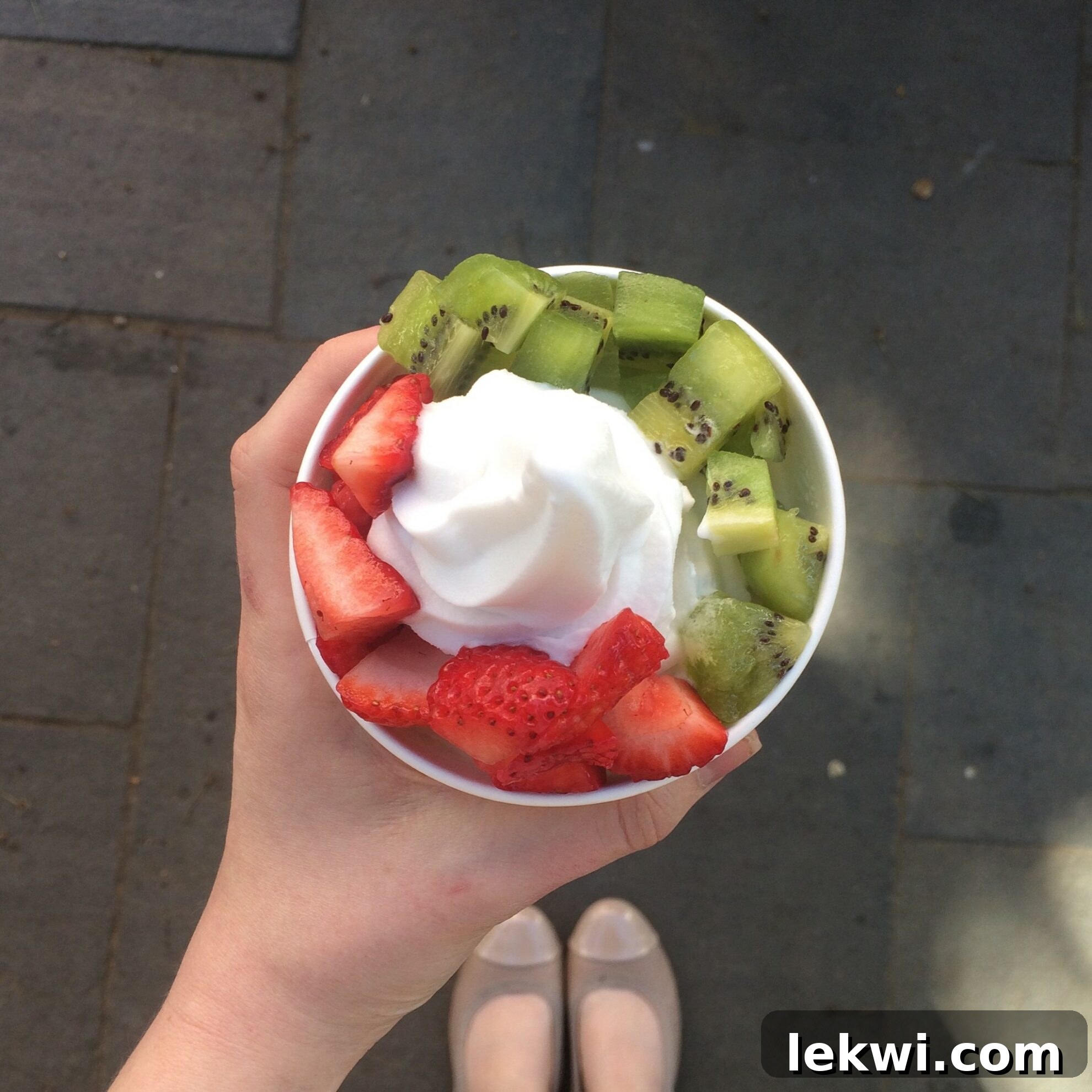 A dairy-free coconut swirl frozen yogurt from Pink Berry, a delightful treat for AIP travelers.