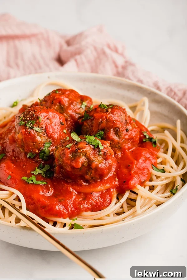 spaghetti and meatballs in a bowl