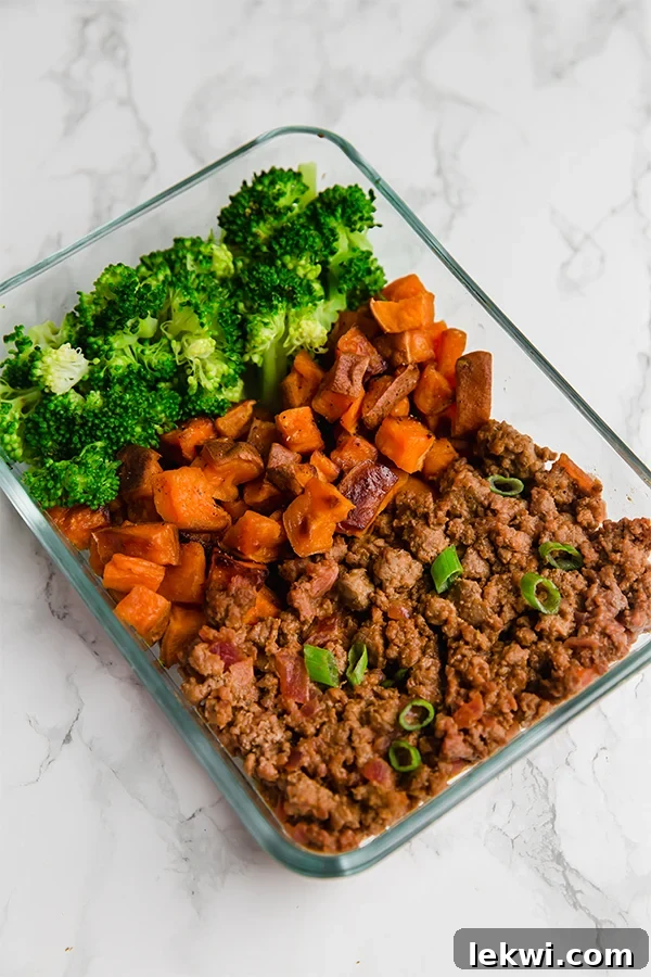 Neatly arranged Sloppy Joe Meal Prep Bowls in clear glass containers, featuring savory sloppy joe mixture with colorful vegetables, ready for the week.