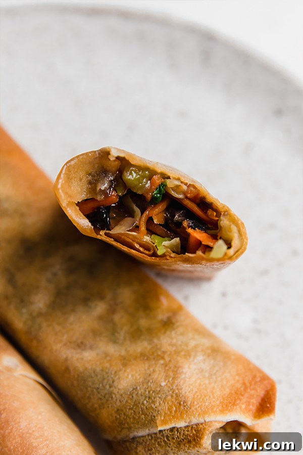air fryer egg rolls open with filling showing