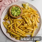 Jicama fries on a plate with dip.