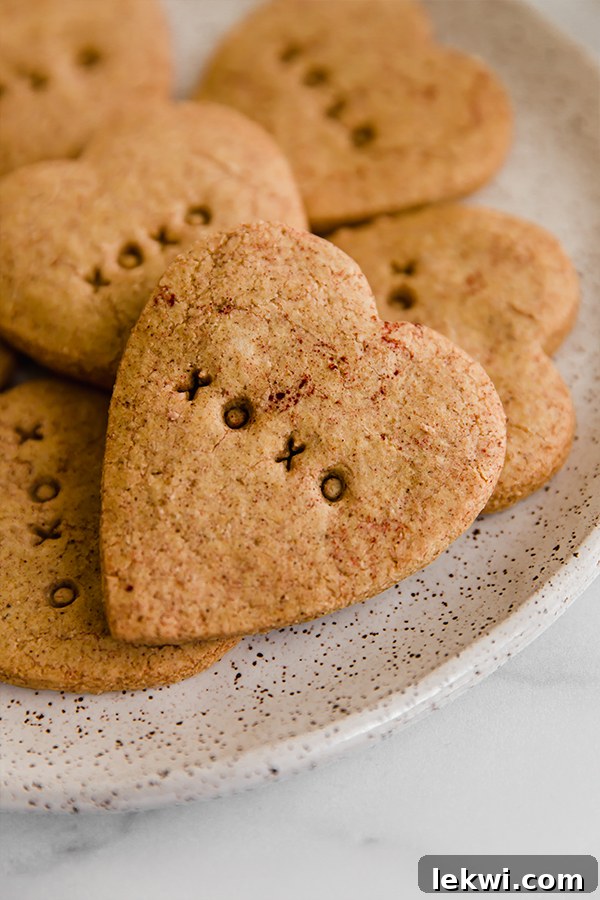 Plated Conversation Heart Sugar Cookies, paleo and AIP, ready to be enjoyed as a healthy Valentine's treat.