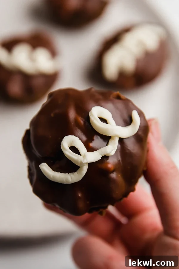 ding dong cupcakes on plate, one in hand