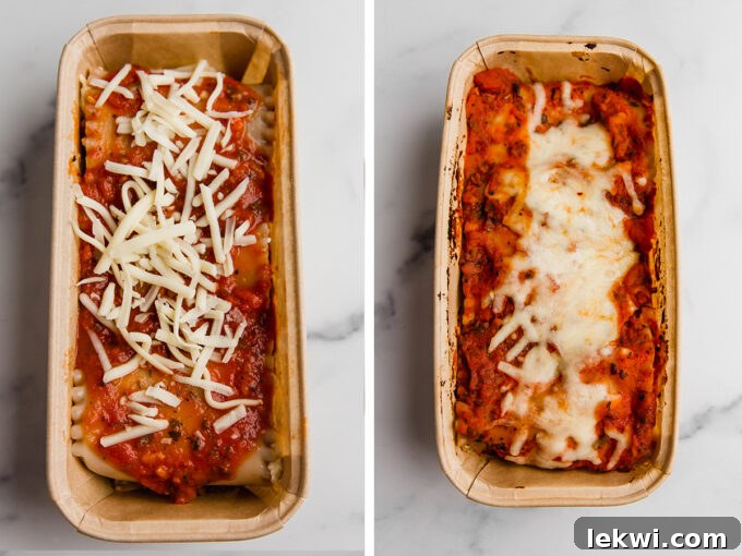 Several assembled lasagna roll-ups nestled in a loaf pan, ready for baking or freezing.