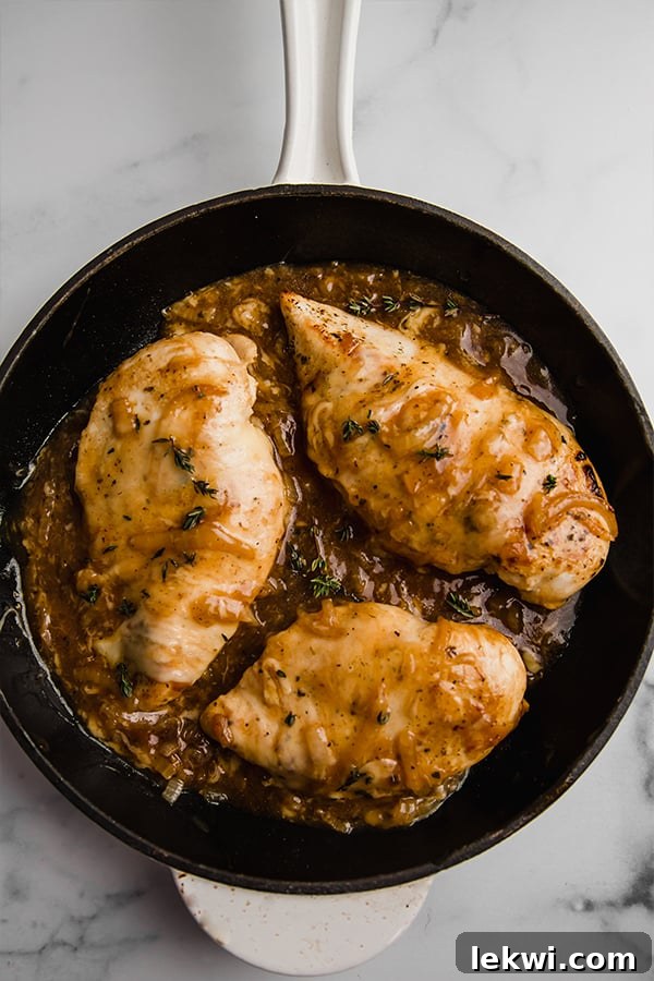 French onion chicken in cast iron skillet