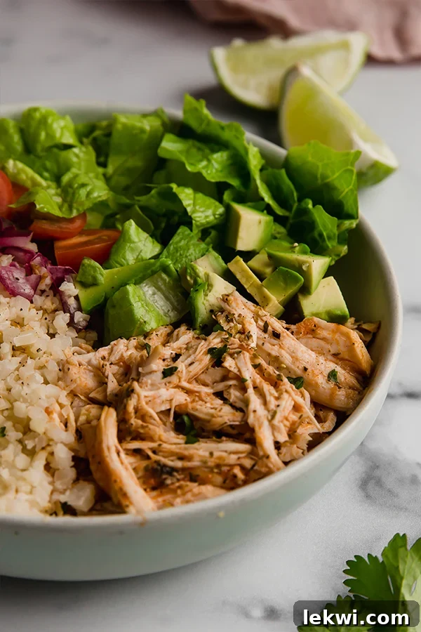 Close up of a freshly assembled and ready-to-eat Instant Pot Chicken Burrito Bowl, showcasing its healthy ingredients.