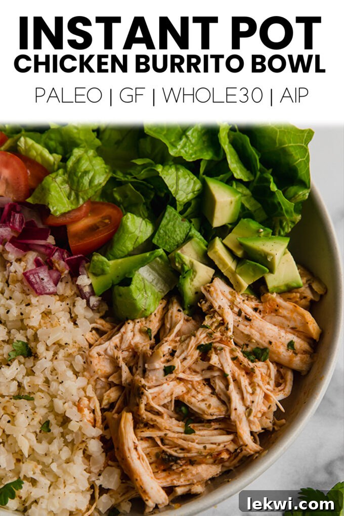 Close up shot of a perfectly assembled Instant Pot Chicken Burrito Bowl, showcasing fresh ingredients and appealing presentation.