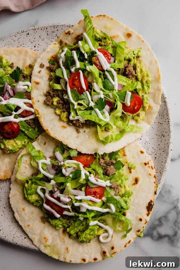 A vibrant platter of freshly made paleo ground beef tostadas, ready to be enjoyed.