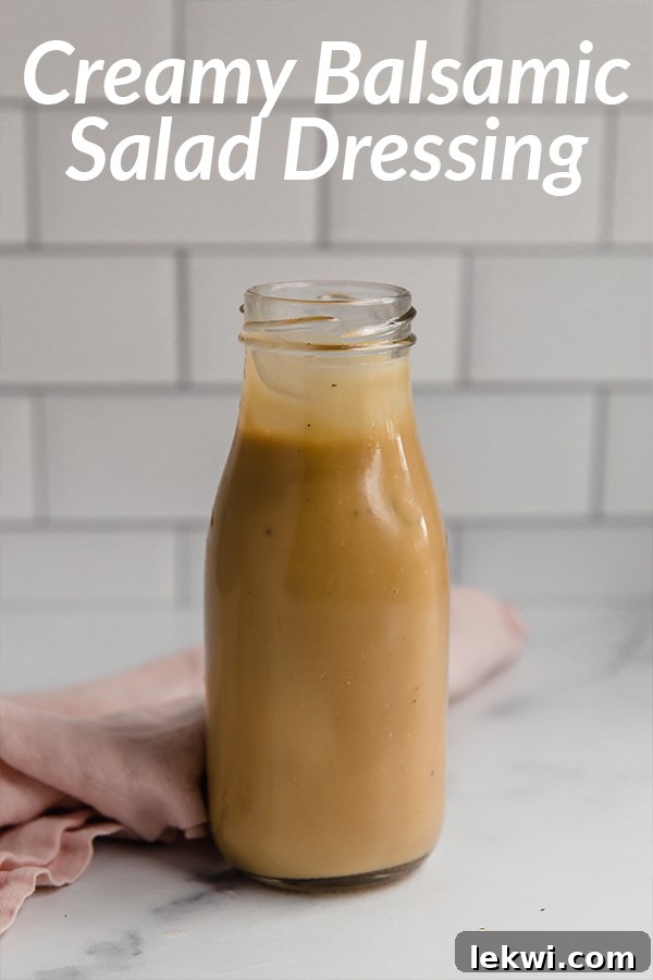 Jar labeled "Creamy Balsamic Salad Dressing," showcasing its smooth, rich texture.