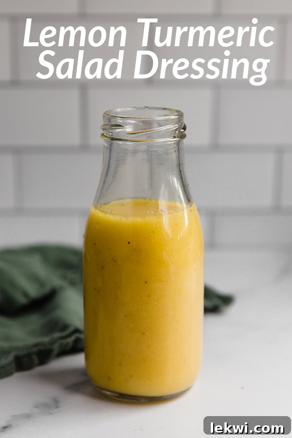 Jar labeled "Lemon Turmeric Salad Dressing," featuring its vibrant yellow color.