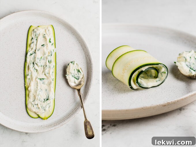 Slices of zucchini with ricotta cheese spread on and rolled up