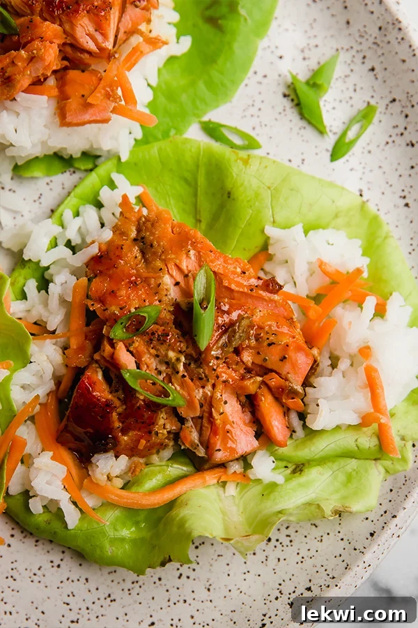 Honey teriyaki salmon lettuce cup with rice, fresh and appetizing.