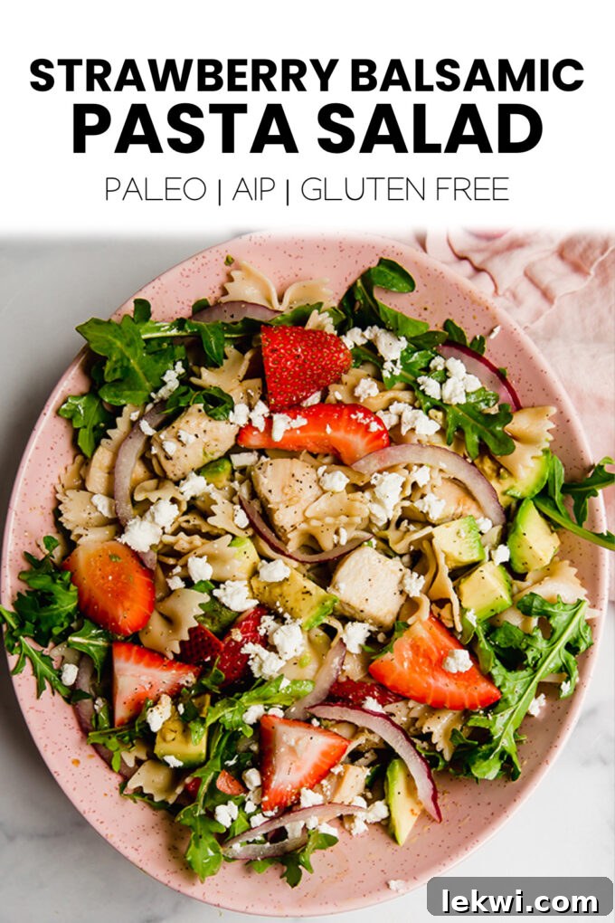 Salad with text "Strawberry Balsamic Pasta Salad Paleo | AIP | Gluten Free."