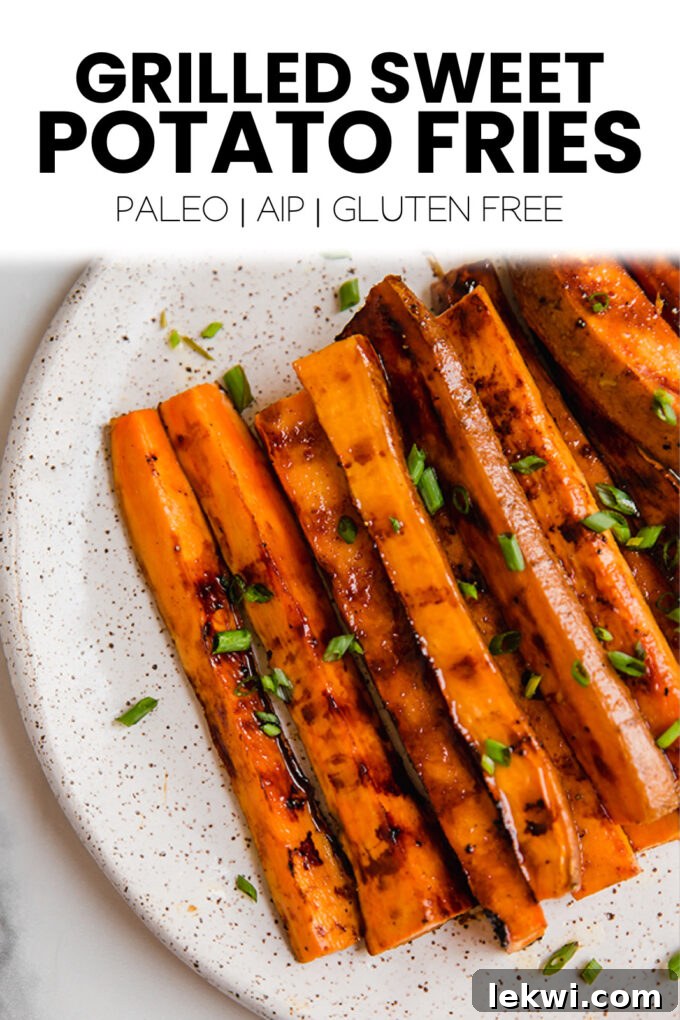 Image featuring grilled sweet potato fries with text overlay "Grilled Sweet Potato Fries Paleo | AIP | Gluten Free." perfect for social sharing on platforms like Pinterest or Instagram.
