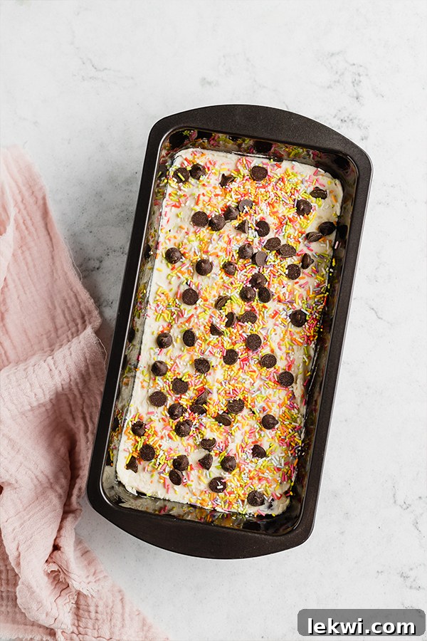 Ice cream bread batter in a loaf pan, ready for baking.