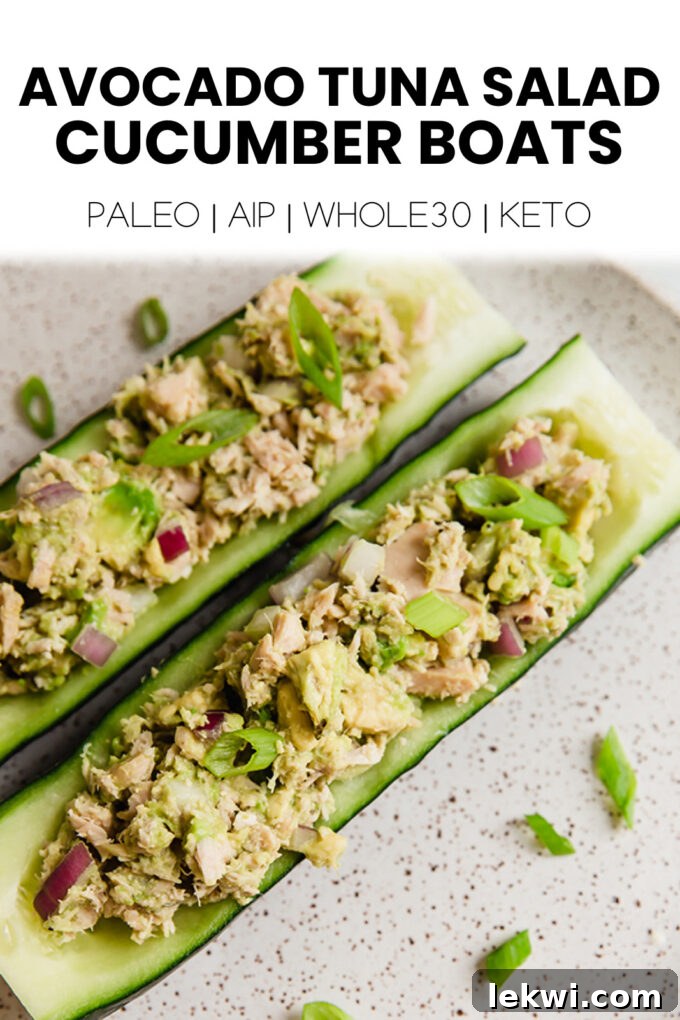 Food with text "Avocado Tuna Salad Cucumber Boats Paleo | AIP | Whole30 | Keto." This image is perfect for Pinterest sharing.