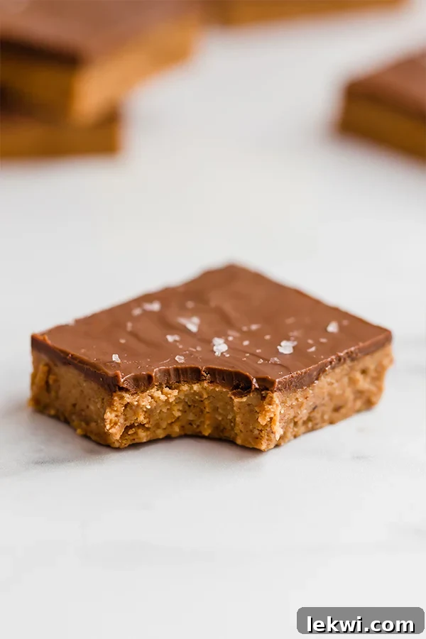 Chocolate almond butter bar on a marbled surface.