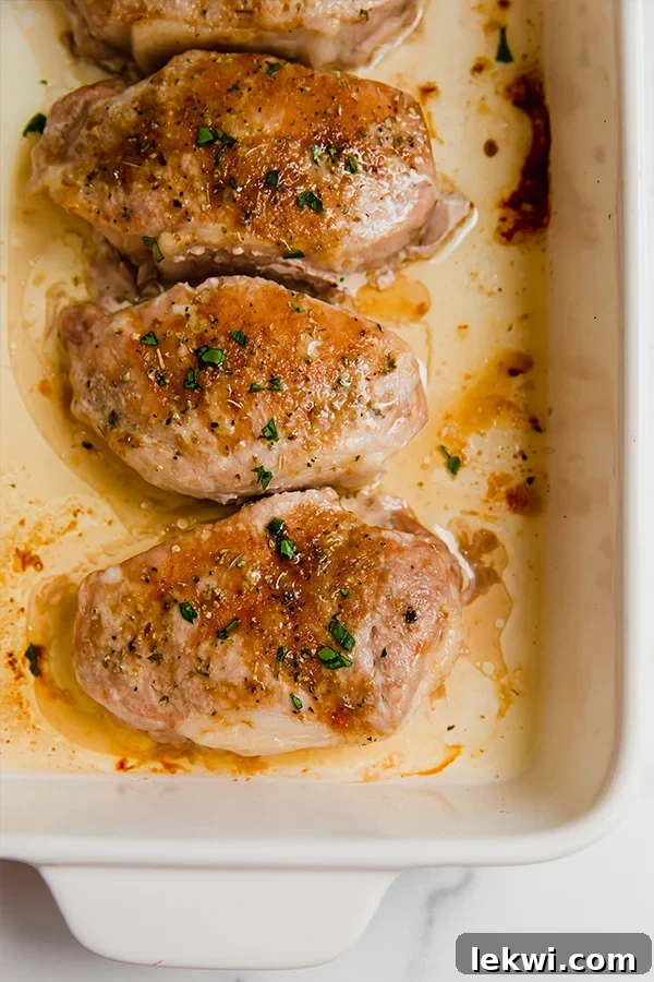 Baked pork chops in a baking dish