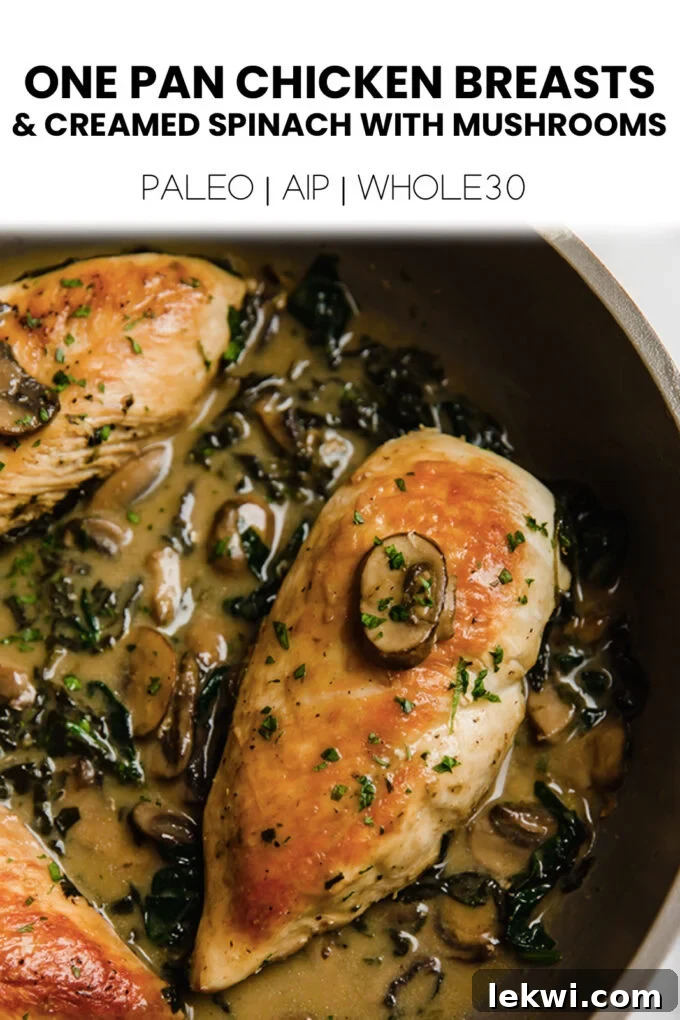 Chicken with text "One Pan Chicken Breasts & Creamed Spinach with Mushrooms Paleo | AIP | Whole30."