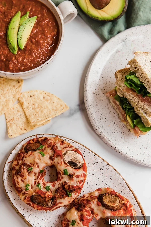 Several plates of food on a marbled table, showcasing various gluten-free lunch options.