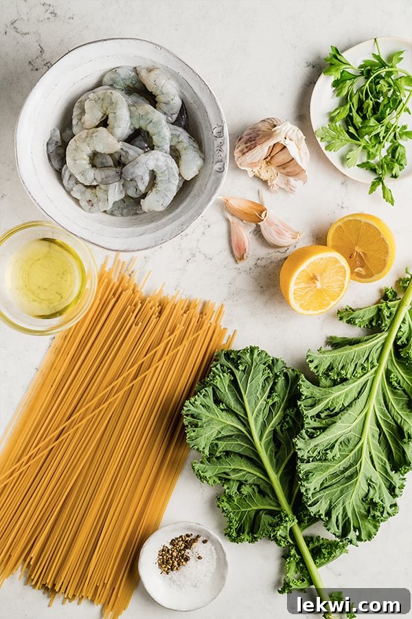 Ingredients for lemon garlic shrimp pasta laid out on a kitchen counter