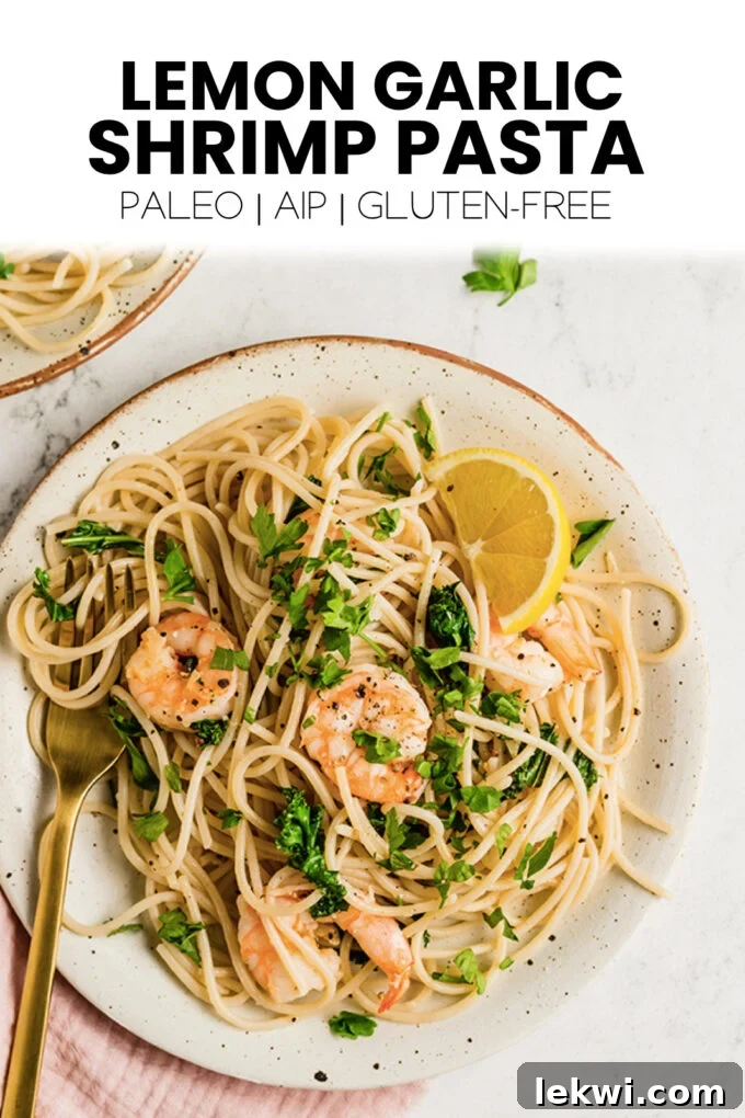 Pinterest graphic with text "Lemon Garlic Shrimp Pasta Paleo | AIP | Gluten-Free" and a picture of the finished dish.