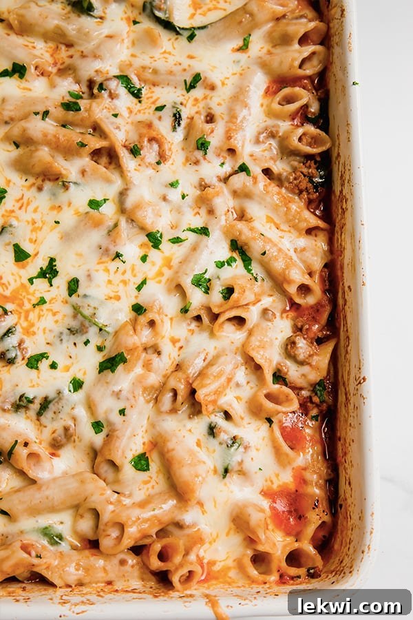 Delicious no-boil pasta bake in a baking dish, freshly cooked.
