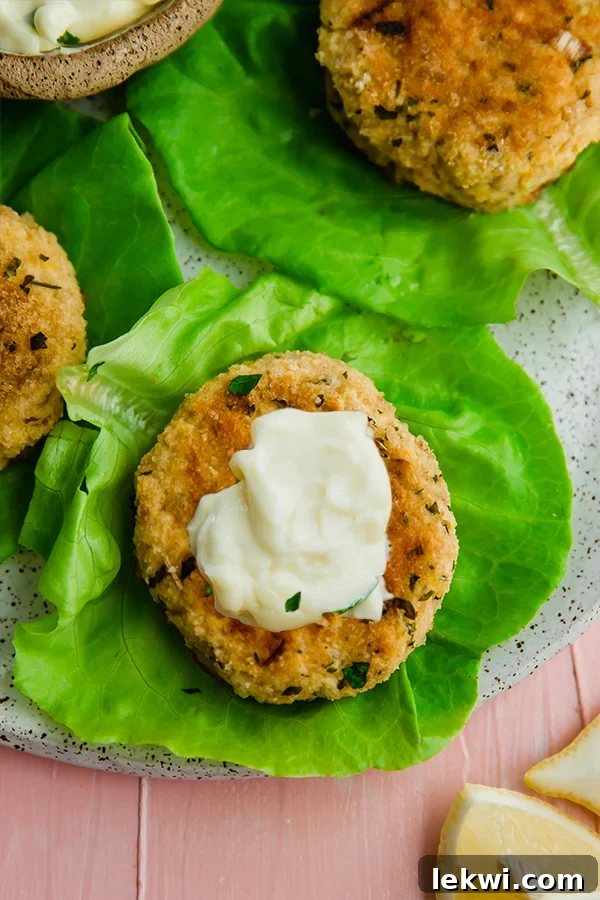Butternut salmon cakes on lettuce.
