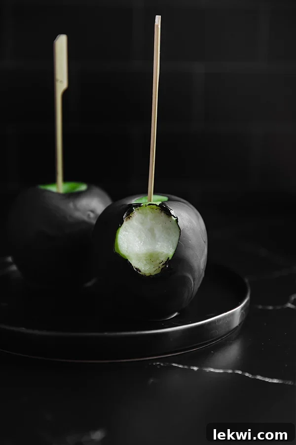 Poison candy apple missing a bite.