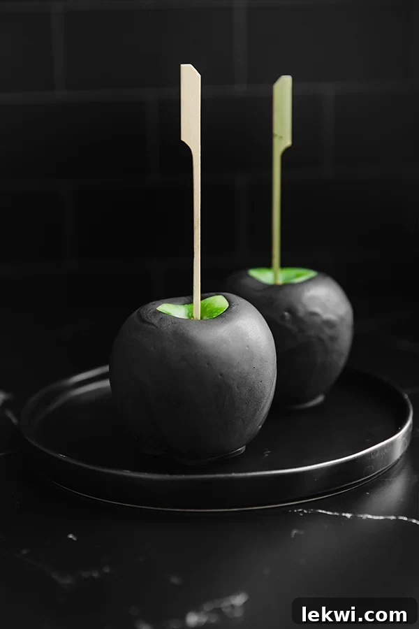 Two poison apples on a plate.