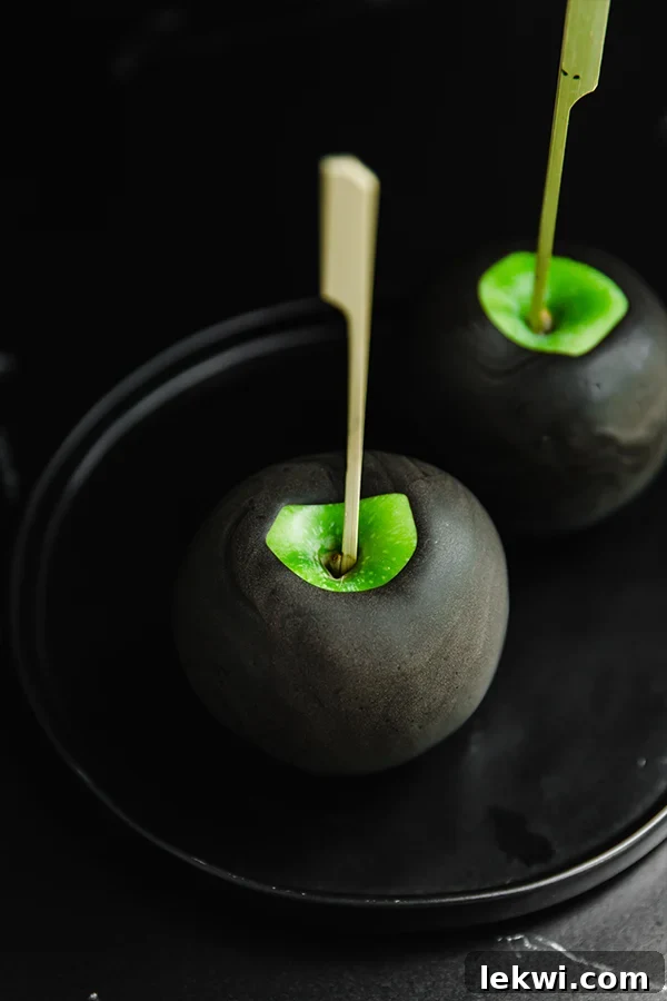 Two poison apples on a plate.