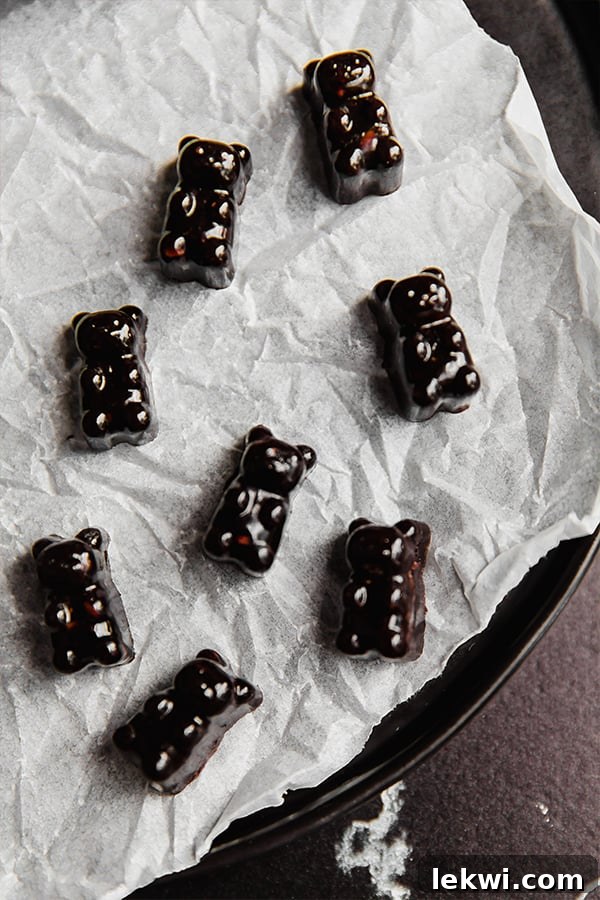 Gummies molded into bears on a white cloth.