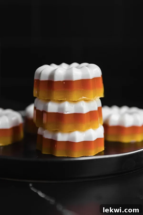 Stack of candy corn mini gelatin molds.