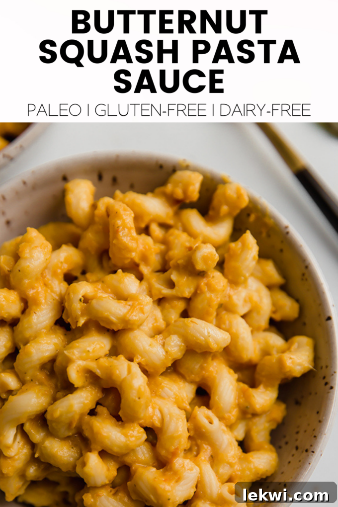 Noodles with the text "Butternut Squash Pasta Sauce Paleo | Gluten-Free | Dairy-Free." beautifully displayed, showcasing the healthy and delicious meal.