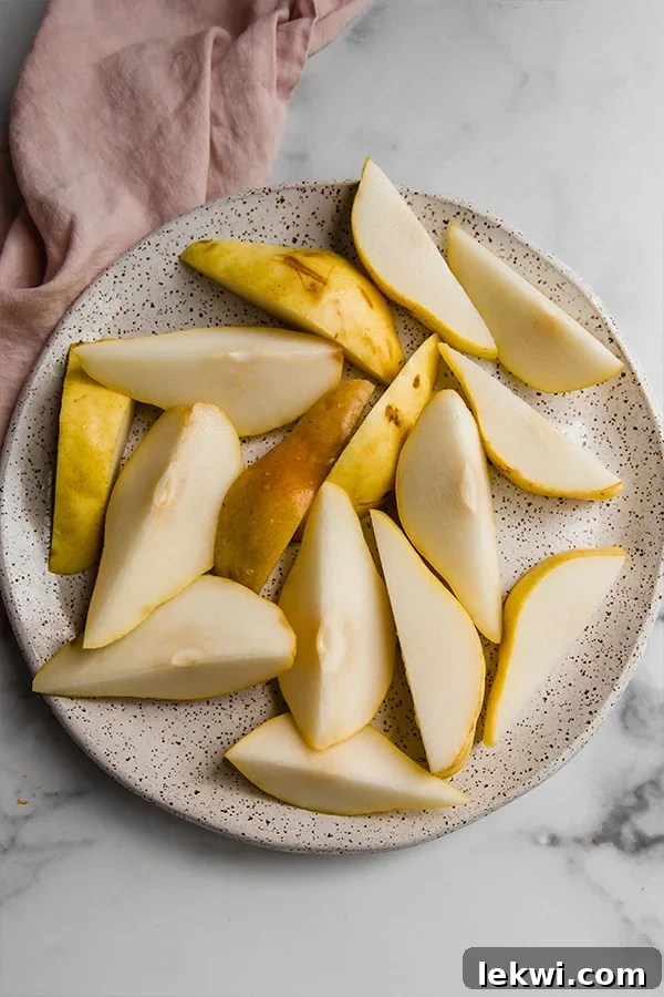 A plate of sliced pears.