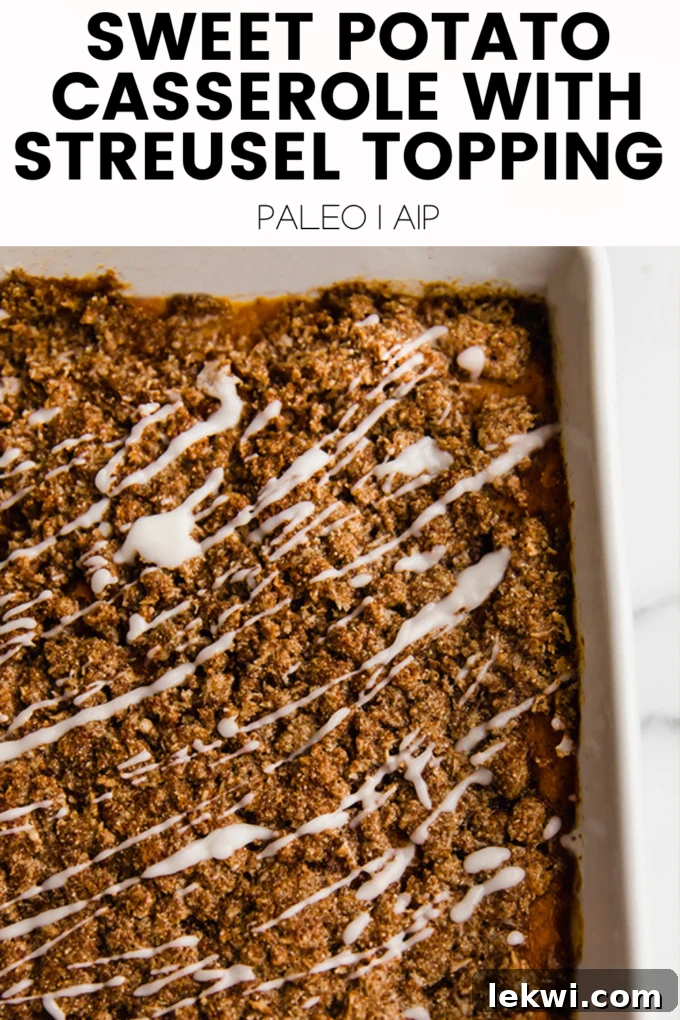 Visually appealing image of the sweet potato casserole with text overlay: "Sweet Potato Casserole with Streusel Topping Paleo | AIP." Highlighting its dietary benefits.
