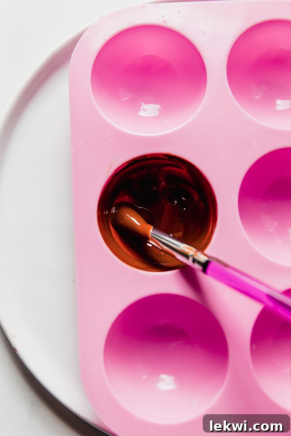 hot cocoa bomb mold with chocolate