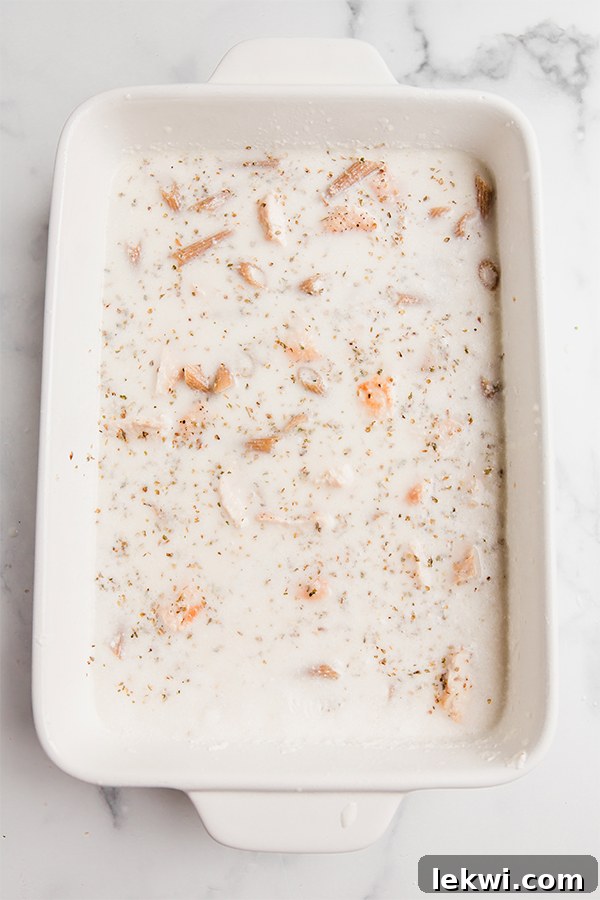 A baking dish with ingredients prior to baking.