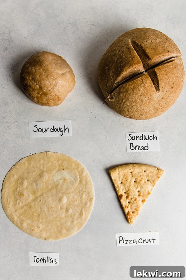 A diverse selection of gluten-free bread products including sourdough, sandwich bread, tortillas, and pizza crust, each clearly labeled.