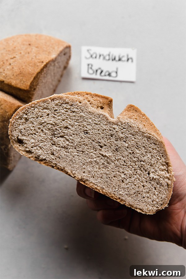 A perfectly baked gluten-free and grain-free sandwich bread loaf, sliced and ready for use.