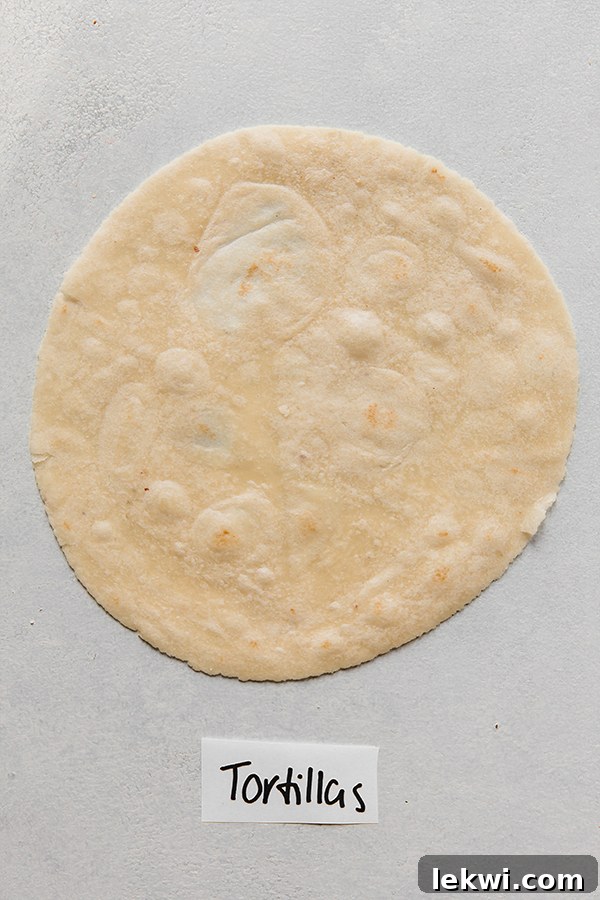 A stack of soft and flexible almond flour tortillas, ready for various culinary uses.